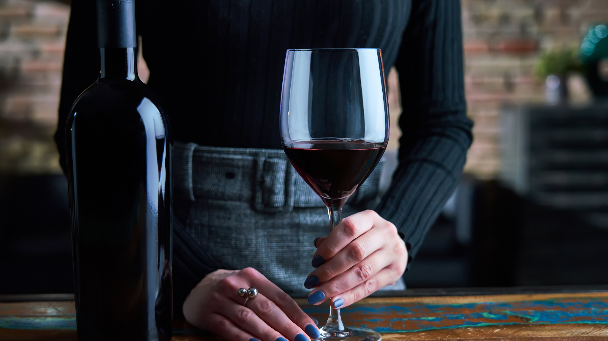 The Art of Holding a Wine Glass